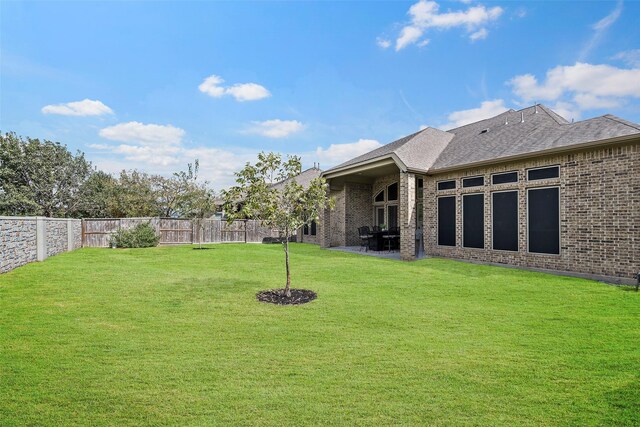 30614 Indigo Falls Dr, Brookshire, TX 77423 - view of yard with a patio area and a fenced backyard