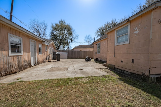 view of yard with a patio area and fence