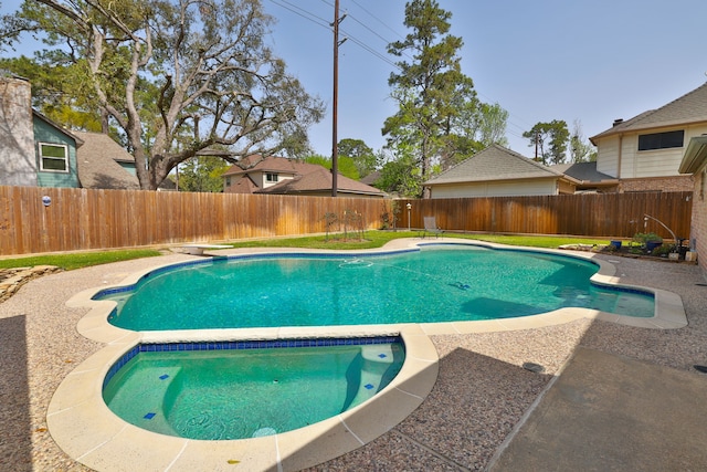 view of swimming pool with a fenced backyard, a fenced in pool, a diving board, and a patio