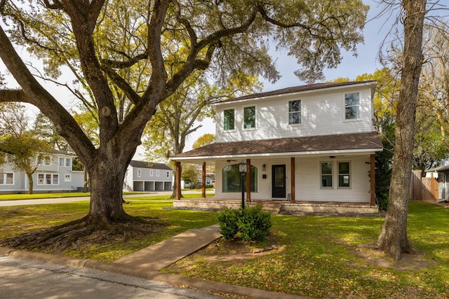 525 Hardeman St, Sealy, TX 77474 - country-style home featuring a porch and a front lawn