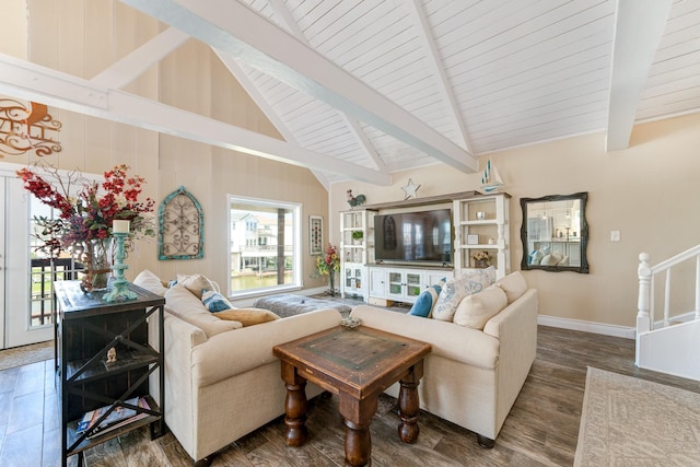 living room with beamed ceiling, high vaulted ceiling, baseboards, and wood finished floors