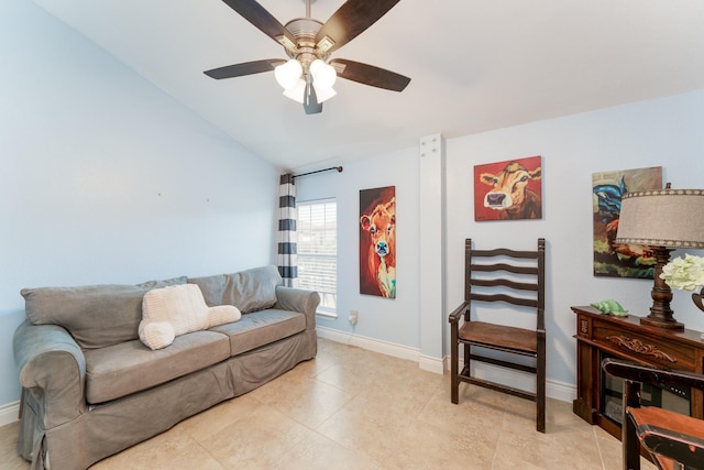 living area with light tile patterned floors, baseboards, lofted ceiling, and ceiling fan