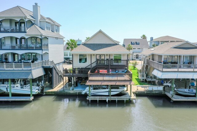 dock area featuring a water view and boat lift