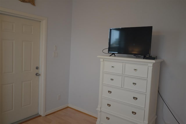 4031 Hardin Dr, Galveston, TX 77554 - interior space with baseboards and light wood-style floors