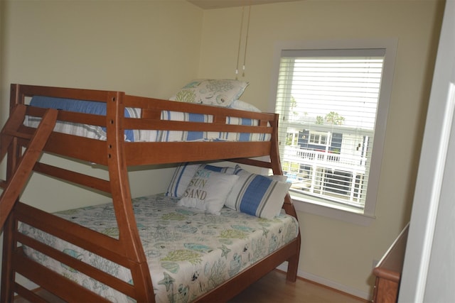 4031 Hardin Dr, Galveston, TX 77554 - bedroom featuring wood finished floors