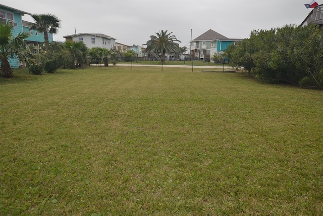 4031 Hardin Dr, Galveston, TX 77554 - view of yard featuring fence