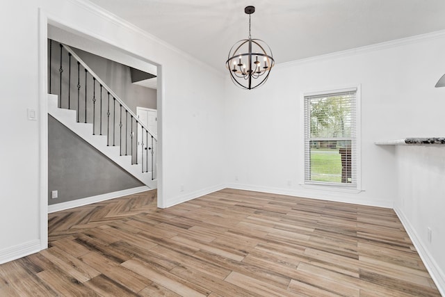 446 Piney Point Dr, Sour Lake, TX 77659 - empty room featuring baseboards, an inviting chandelier, wood finished floors, and crown molding