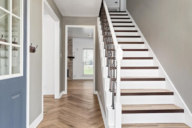446 Piney Point Dr, Sour Lake, TX 77659 - stairway featuring baseboards