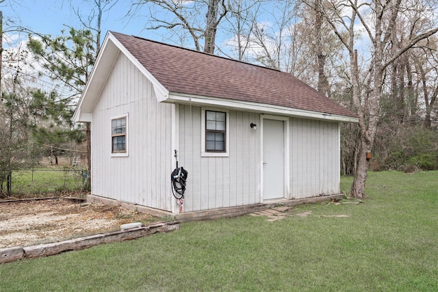 446 Piney Point Dr, Sour Lake, TX 77659 - view of outdoor structure featuring an outbuilding and fence