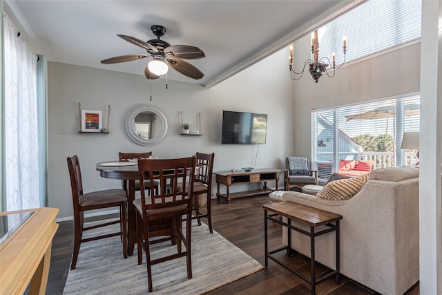 908 Calico Jack Cv, Galveston, TX 77554 - dining area featuring dark wood-style floors, a ceiling fan, and a chandelier