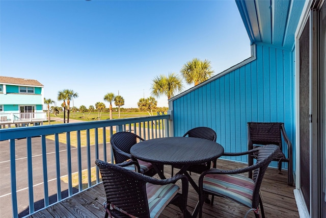 908 Calico Jack Cv, Galveston, TX 77554 - balcony featuring outdoor dining space