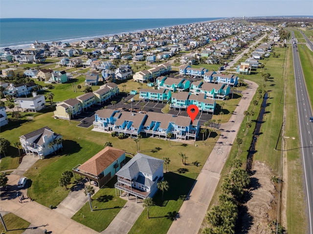 908 Calico Jack Cv, Galveston, TX 77554 - aerial view of property's location with a large body of water and nearby suburban area