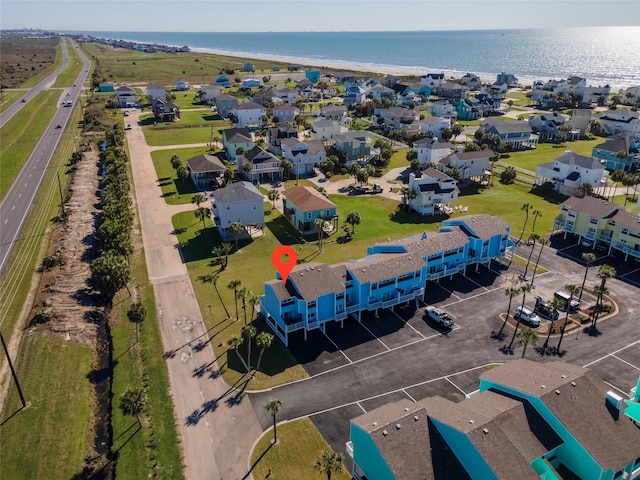 908 Calico Jack Cv, Galveston, TX 77554 - aerial perspective of suburban area featuring a large body of water