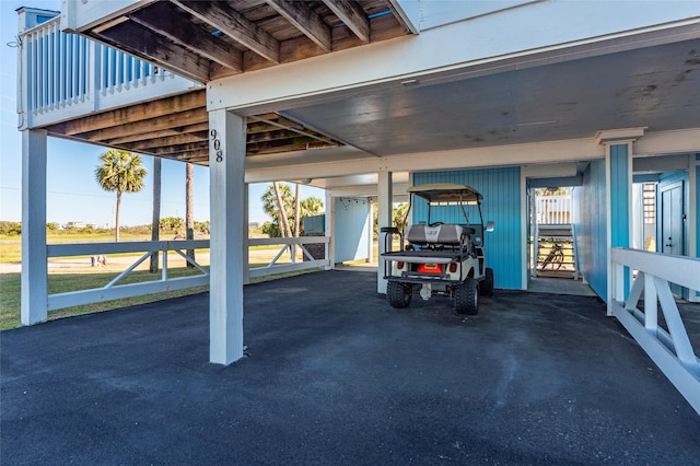 908 Calico Jack Cv, Galveston, TX 77554 - view of patio / terrace with a carport