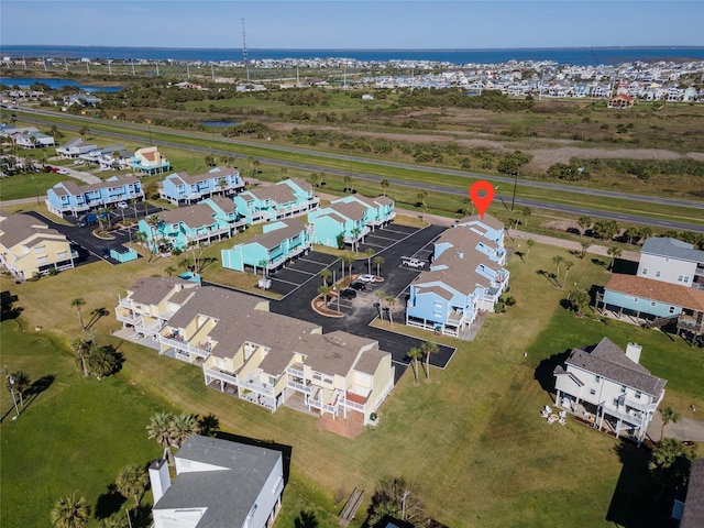 908 Calico Jack Cv, Galveston, TX 77554 - aerial view of property's location featuring nearby suburban area and a nearby body of water