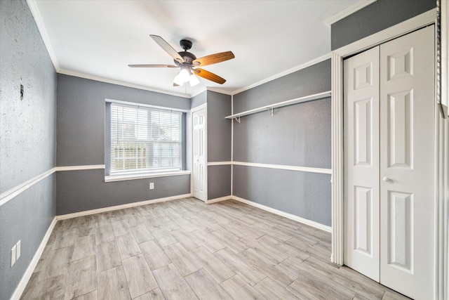 12007 Fairpoint Dr, Houston, TX 77099 - spare room featuring ornamental molding, a ceiling fan, wood finished floors, baseboards, and a textured wall