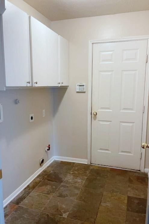 7931 Clarion Way, Houston, TX 77040 - laundry area with cabinet space, electric dryer hookup, baseboards, and hookup for a gas dryer