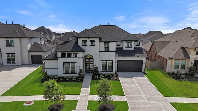 french provincial home featuring a residential view, stucco siding, driveway, and a front yard