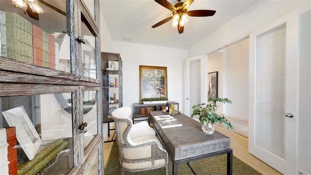 12043 Lake View Blvd, Mont Belvieu, TX 77523 - office area with a ceiling fan and light wood-style floors