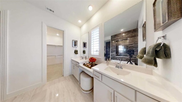 12043 Lake View Blvd, Mont Belvieu, TX 77523 - full bathroom featuring a shower stall, vanity, marble finish flooring, a walk in closet, and recessed lighting