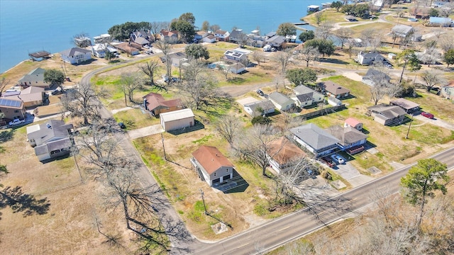aerial view featuring a residential view and a water view
