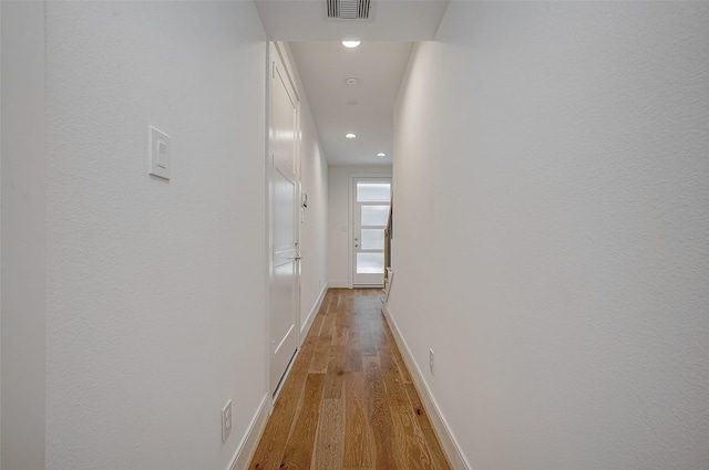 2414 Canal St Unit A, Houston, TX 77003 - hallway featuring light wood finished floors, recessed lighting, and baseboards
