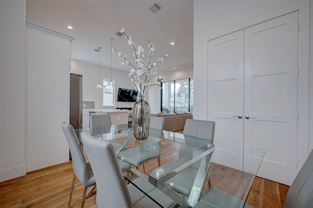 2414 Canal St Unit A, Houston, TX 77003 - dining space with light wood-type flooring and recessed lighting