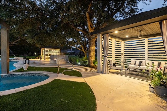 outdoor pool with a patio and fence