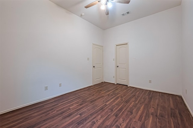 6010 Le Moyne Pass Ln, Missouri City, TX 77459 - unfurnished room featuring dark wood-style floors, a ceiling fan, visible vents, and baseboards