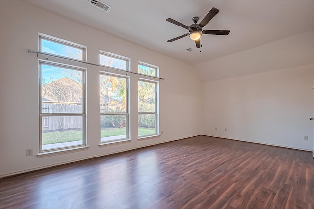 6010 Le Moyne Pass Ln, Missouri City, TX 77459 - empty room with dark wood-type flooring, vaulted ceiling, visible vents, and ceiling fan