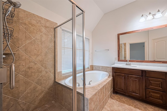 6010 Le Moyne Pass Ln, Missouri City, TX 77459 - bathroom with vanity, vaulted ceiling, a shower stall, a garden tub, and tile patterned floors