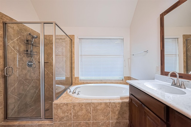 6010 Le Moyne Pass Ln, Missouri City, TX 77459 - full bathroom featuring a shower stall, vanity, a garden tub, and vaulted ceiling