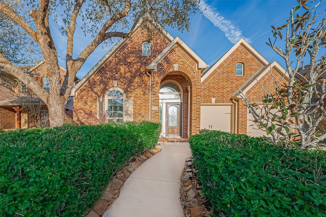 6010 Le Moyne Pass Ln, Missouri City, TX 77459 - view of front of house with brick siding and a garage