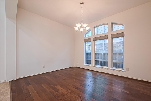 6010 Le Moyne Pass Ln, Missouri City, TX 77459 - unfurnished room with wood-type flooring and an inviting chandelier