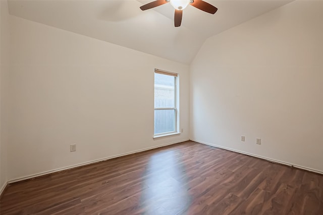 6010 Le Moyne Pass Ln, Missouri City, TX 77459 - unfurnished room with dark wood-type flooring, a ceiling fan, and vaulted ceiling