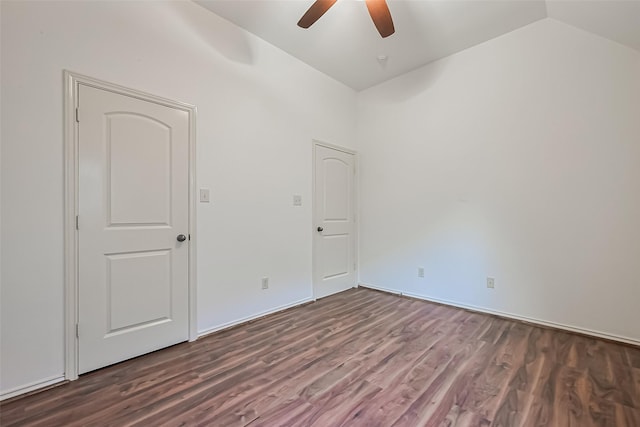 6010 Le Moyne Pass Ln, Missouri City, TX 77459 - spare room with lofted ceiling, dark wood-type flooring, and ceiling fan