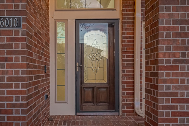 6010 Le Moyne Pass Ln, Missouri City, TX 77459 - view of exterior entry featuring brick siding