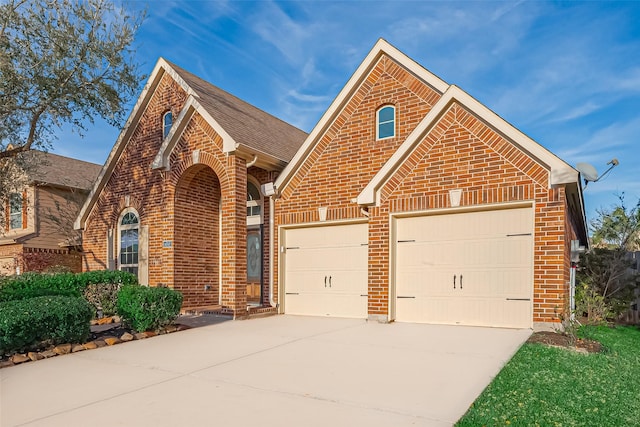 6010 Le Moyne Pass Ln, Missouri City, TX 77459 - traditional-style house featuring a garage, brick siding, and driveway