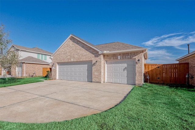 view of front of house with fence, an attached garage, a front lawn, concrete driveway, and brick siding