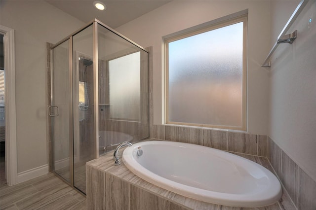 full bathroom with a garden tub, recessed lighting, and a stall shower