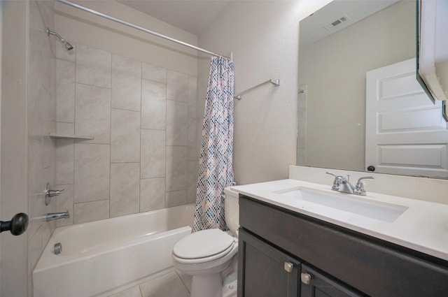 full bathroom featuring vanity, visible vents, tile patterned floors, toilet, and shower / tub combo with curtain
