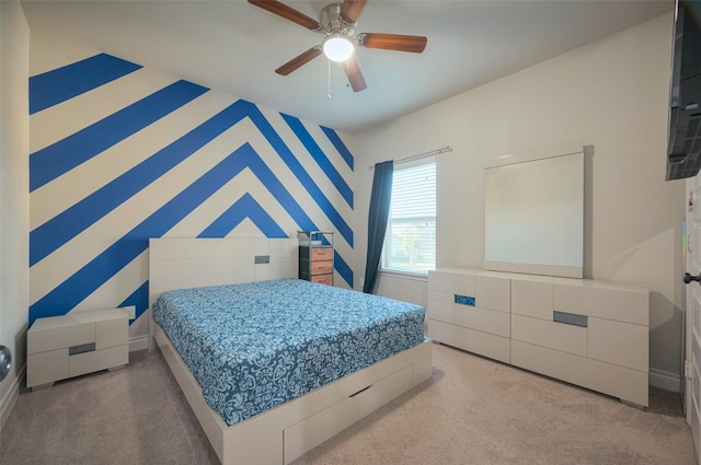 bedroom with carpet and a ceiling fan