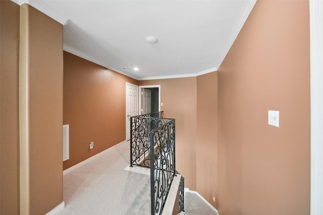 2112 Mcduffie St, Houston, TX 77019 - hallway featuring an upstairs landing, light colored carpet, crown molding, baseboards, and recessed lighting