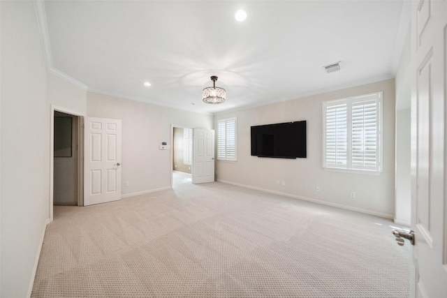 2112 Mcduffie St, Houston, TX 77019 - unfurnished bedroom featuring ornamental molding, baseboards, light colored carpet, and recessed lighting