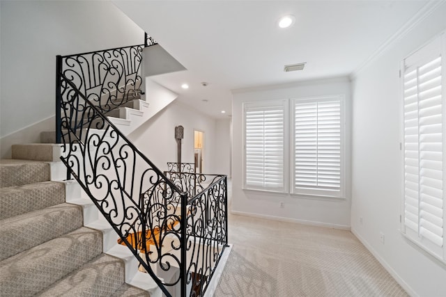 2112 Mcduffie St, Houston, TX 77019 - staircase with carpet, recessed lighting, and crown molding