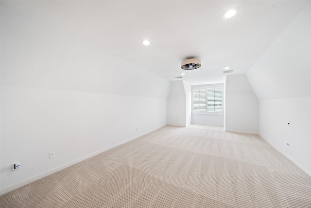 2112 Mcduffie St, Houston, TX 77019 - bonus room with lofted ceiling, light carpet, and recessed lighting