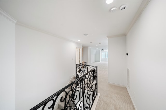 2112 Mcduffie St, Houston, TX 77019 - corridor with an upstairs landing, ornamental molding, light colored carpet, and recessed lighting