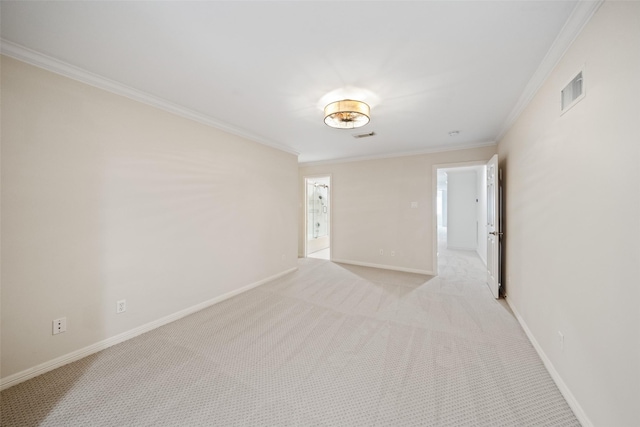 2112 Mcduffie St, Houston, TX 77019 - unfurnished room featuring crown molding and light colored carpet
