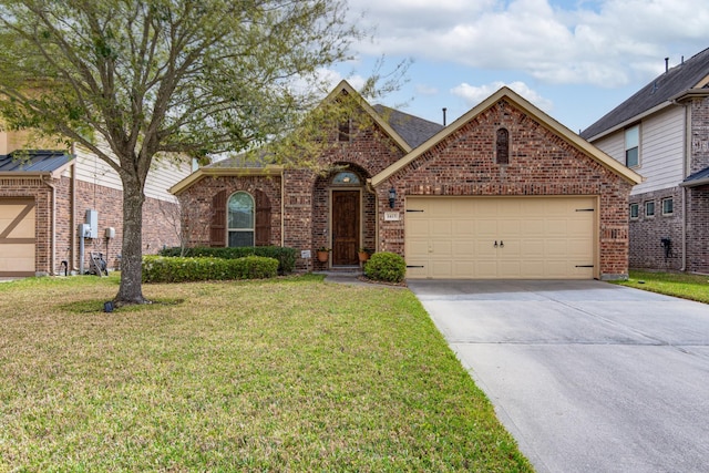 1415 Nacogdoches Valley Dr, League City, TX 77573 - view of front facade with brick siding, an attached garage, concrete driveway, and a front yard