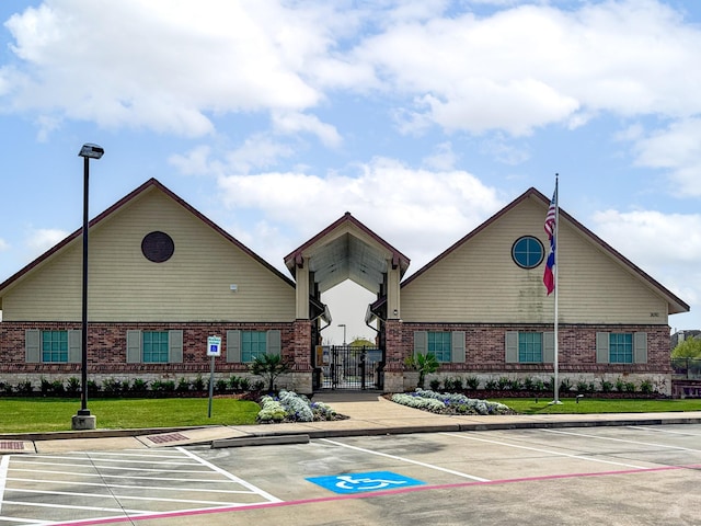 1415 Nacogdoches Valley Dr, League City, TX 77573 - view of property featuring uncovered parking and fence